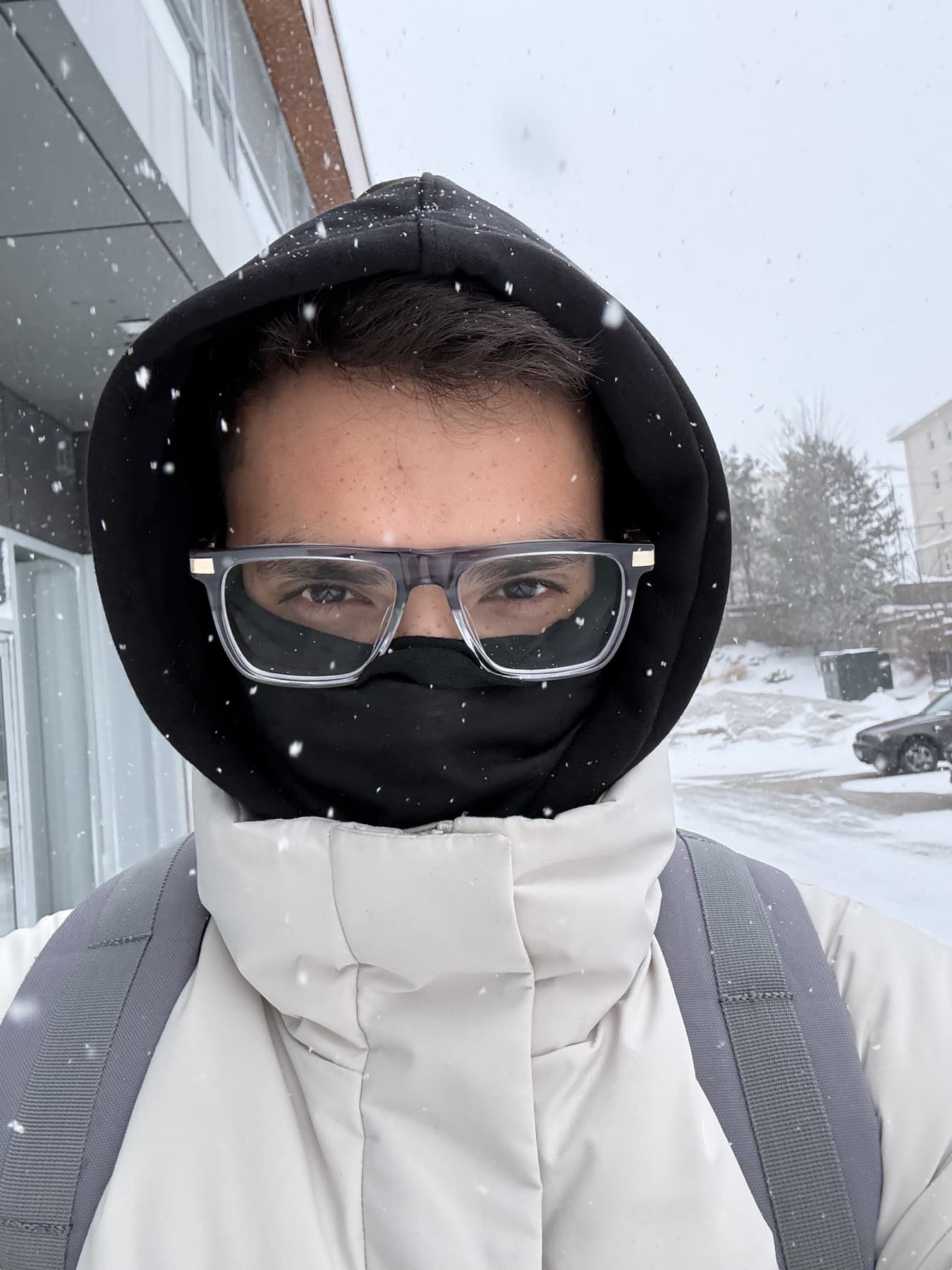 Manan walking through a Waterloo snowstorm